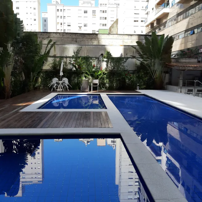Foto 1 de Flat com 2 Quartos à venda, 66m² em Pitangueiras, Guarujá