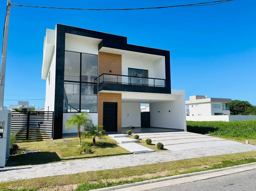 Foto 1 de Casa de Condomínio com 4 Quartos à venda, 230m² em Peró, Cabo Frio