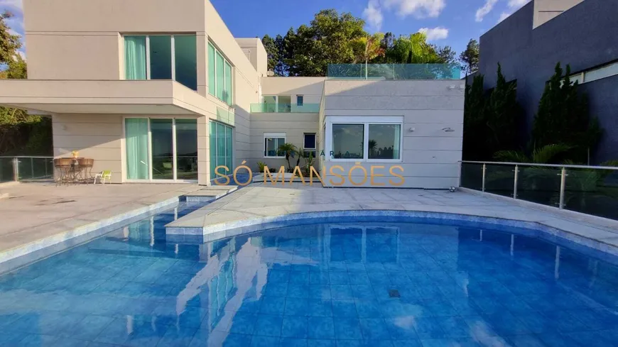 Foto 1 de Casa de Condomínio com 4 Quartos à venda, 431m² em Vila  Alpina, Nova Lima