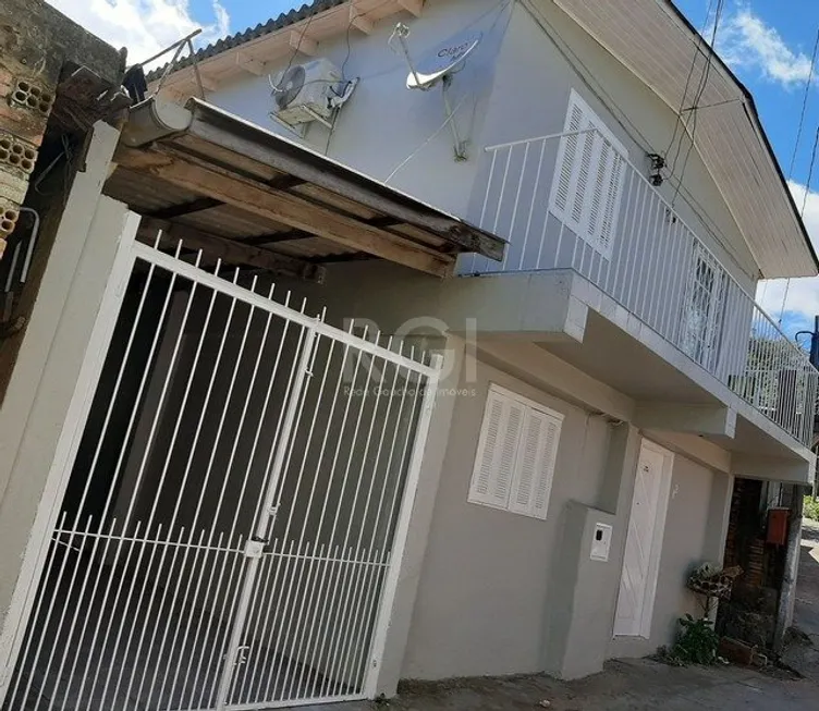 Foto 1 de Casa com 4 Quartos à venda, 199m² em Partenon, Porto Alegre