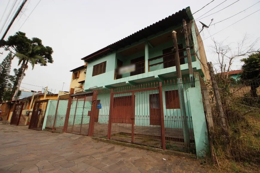 Foto 1 de Casa com 3 Quartos à venda, 299m² em Jardim Itú Sabará, Porto Alegre