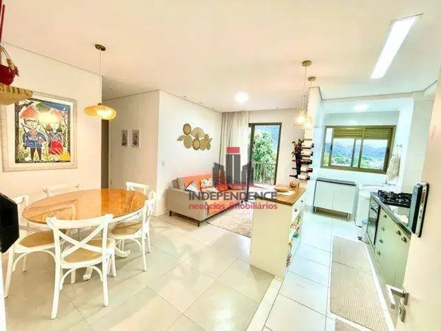 Foto 1 de Apartamento com 2 Quartos à venda, 57m² em Martim de Sa, Caraguatatuba