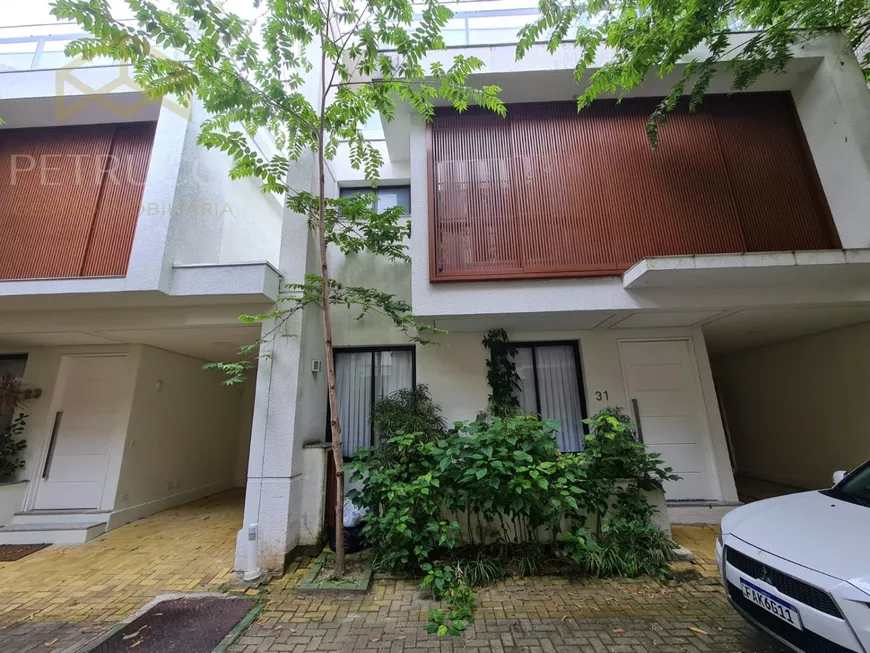 Foto 1 de Casa de Condomínio com 4 Quartos à venda, 172m² em Camburi, São Sebastião