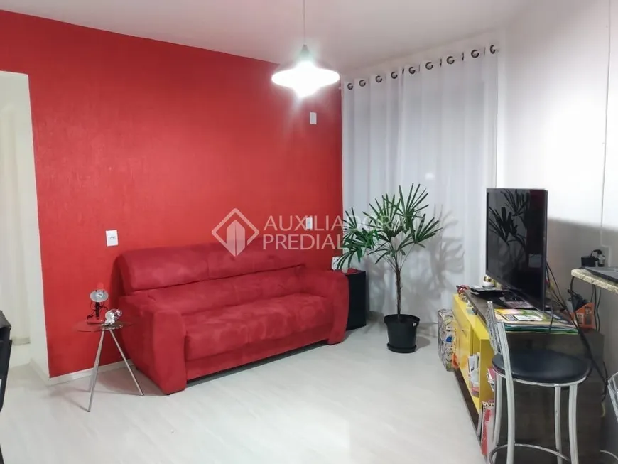 Foto 1 de Apartamento com 1 Quarto à venda, 46m² em Nonoai, Porto Alegre