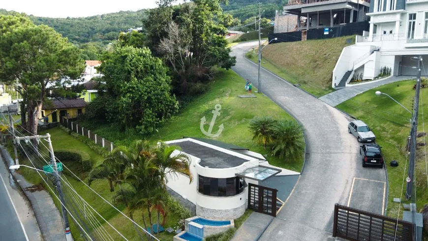 Foto 1 de Casa de Condomínio com 4 Quartos à venda, 344m² em Itacorubi, Florianópolis