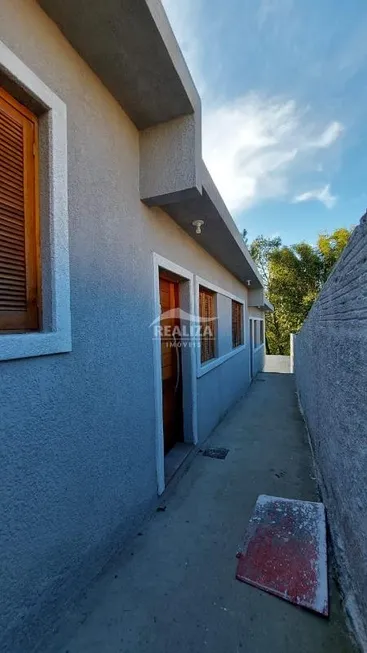 Foto 1 de Casa com 2 Quartos à venda, 48m² em Tarumã, Viamão