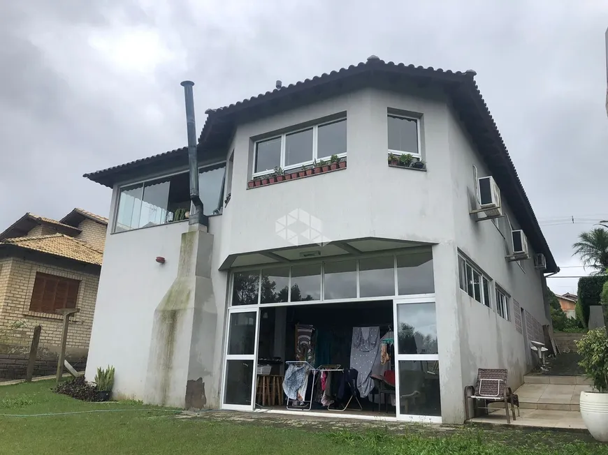 Foto 1 de Casa de Condomínio com 3 Quartos à venda, 236m² em Elsa, Viamão