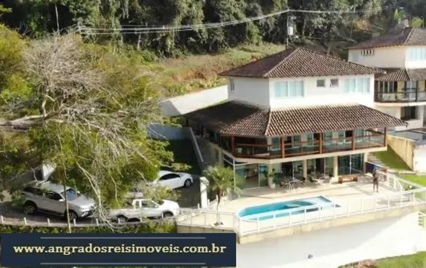 Foto 1 de Casa de Condomínio com 4 Quartos à venda, 467m² em Centro, Angra dos Reis