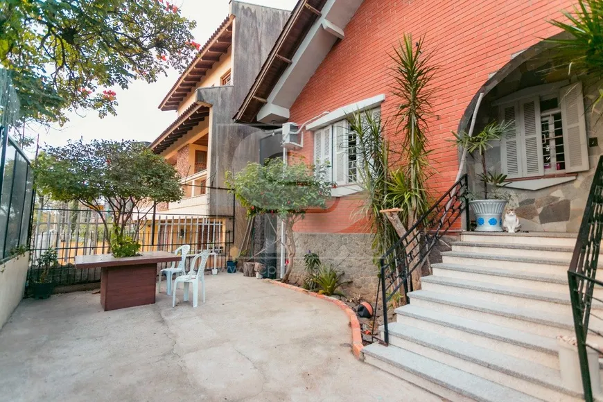 Foto 1 de Casa com 4 Quartos à venda, 297m² em Vila Ipiranga, Porto Alegre
