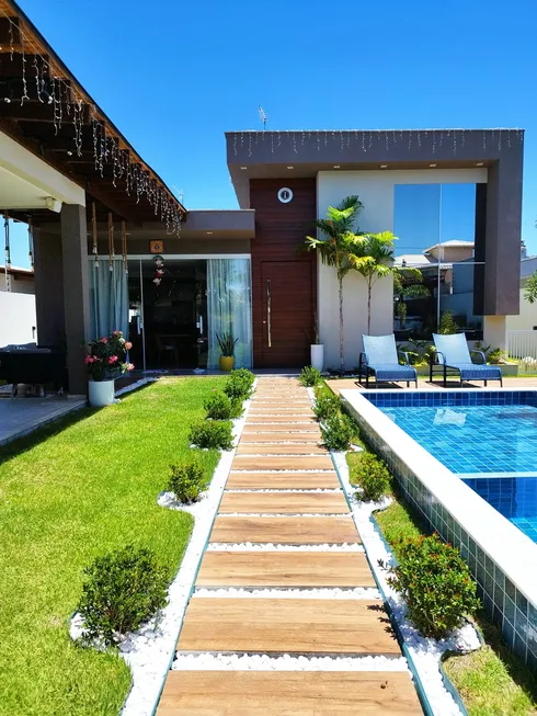 Foto 1 de Casa de Condomínio com 4 Quartos à venda, 170m² em Barra do Jacuípe, Camaçari