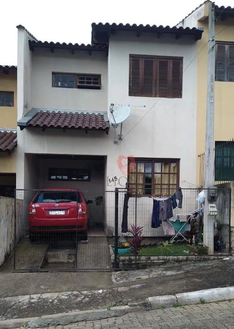 Foto 1 de Sobrado com 2 Quartos à venda, 74m² em Auxiliadora, Gravataí