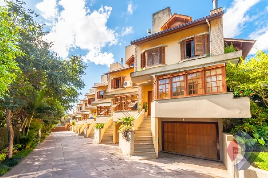 Foto 1 de Casa de Condomínio com 4 Quartos à venda, 318m² em Tristeza, Porto Alegre