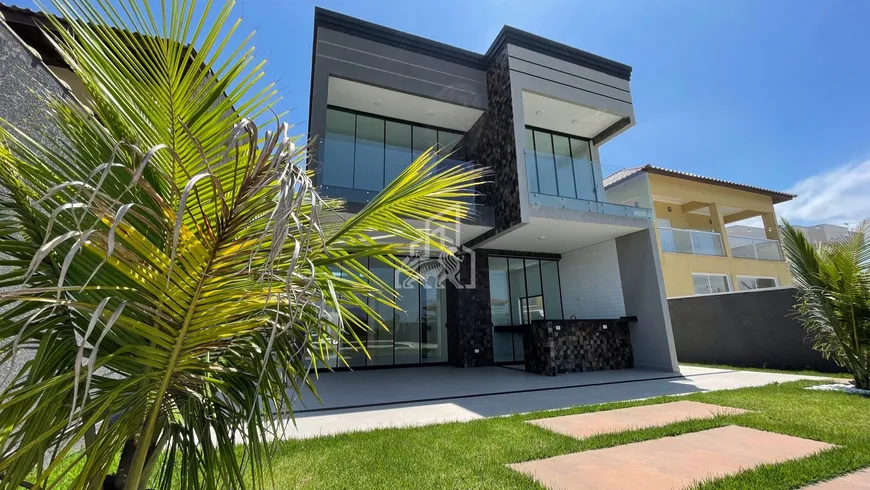 Foto 1 de Casa de Condomínio com 4 Quartos à venda, 250m² em Jardim das Palmeiras, Itanhaém