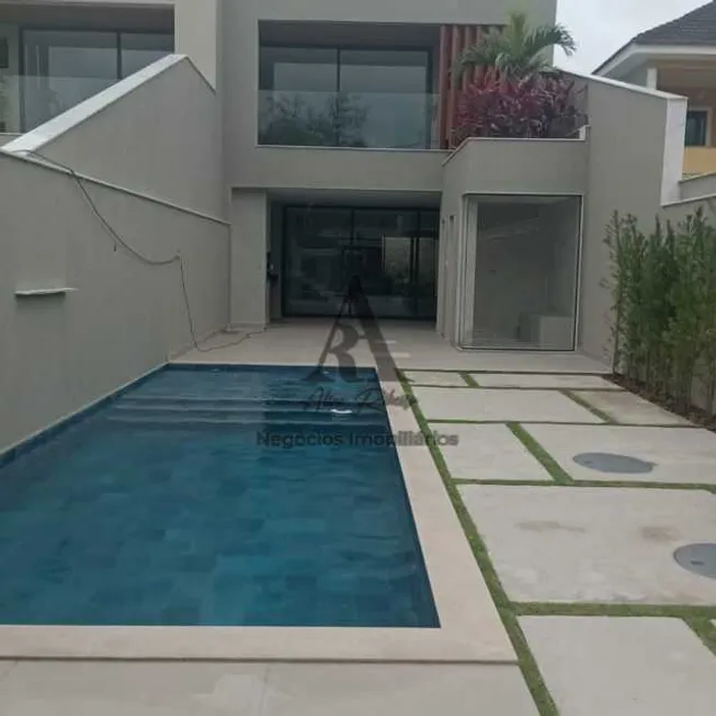 Foto 1 de Casa de Condomínio com 4 Quartos à venda, 350m² em Barra da Tijuca, Rio de Janeiro