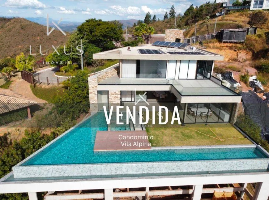 Foto 1 de Casa com 4 Quartos à venda, 577m² em Vila  Alpina, Nova Lima