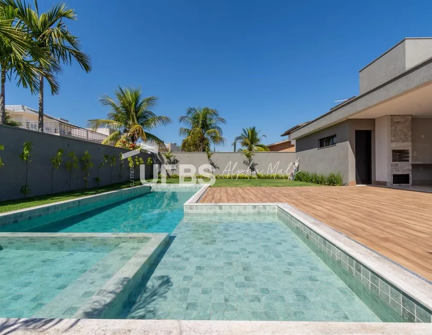 Foto 1 de Casa de Condomínio com 4 Quartos à venda, 490m² em Alphaville Cruzeiro, Goiânia