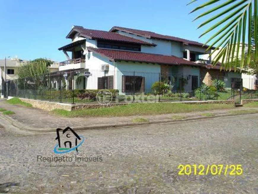 Foto 1 de Casa com 5 Quartos à venda, 460m² em Centro, Tramandaí