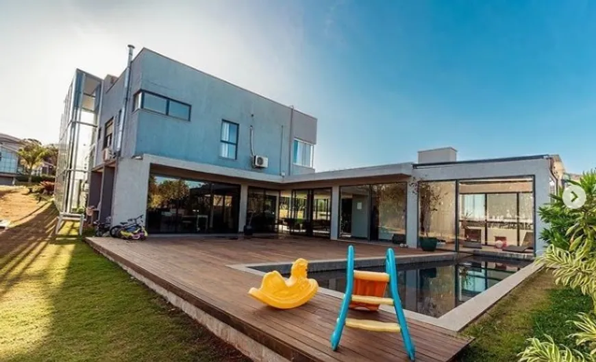 Foto 1 de Casa de Condomínio com 7 Quartos à venda, 490m² em Balneario Água Limpa, Nova Lima