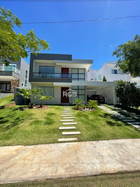 Foto 1 de Casa de Condomínio com 4 Quartos à venda, 240m² em Alphaville Abrantes, Camaçari
