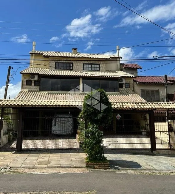 Foto 1 de Casa com 3 Quartos à venda, 203m² em Ipanema, Porto Alegre