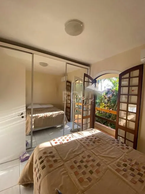 Foto 1 de Casa de Condomínio com 5 Quartos à venda, 327m² em Cristal, Porto Alegre