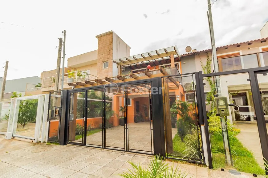 Foto 1 de Casa de Condomínio com 3 Quartos à venda, 142m² em Hípica, Porto Alegre