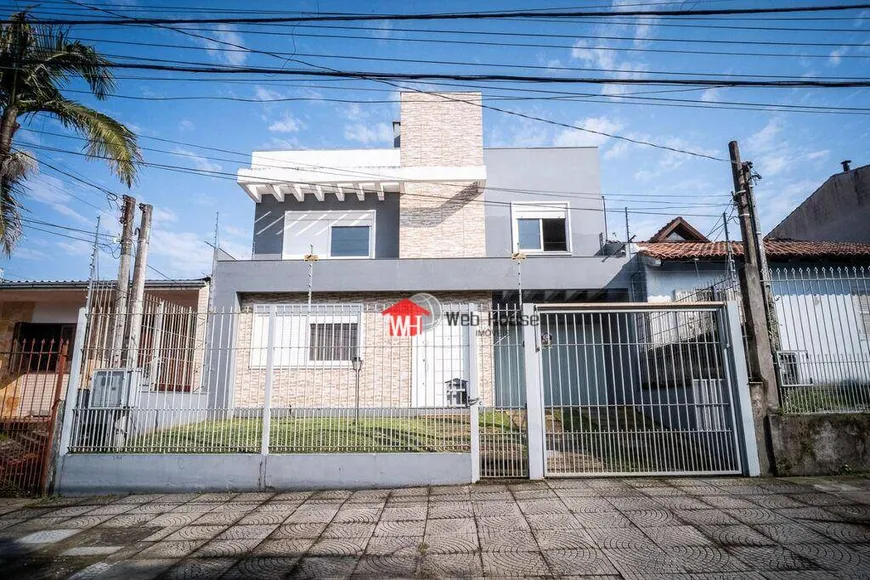 Foto 1 de Casa de Condomínio com 4 Quartos à venda, 199m² em Protásio Alves, Porto Alegre