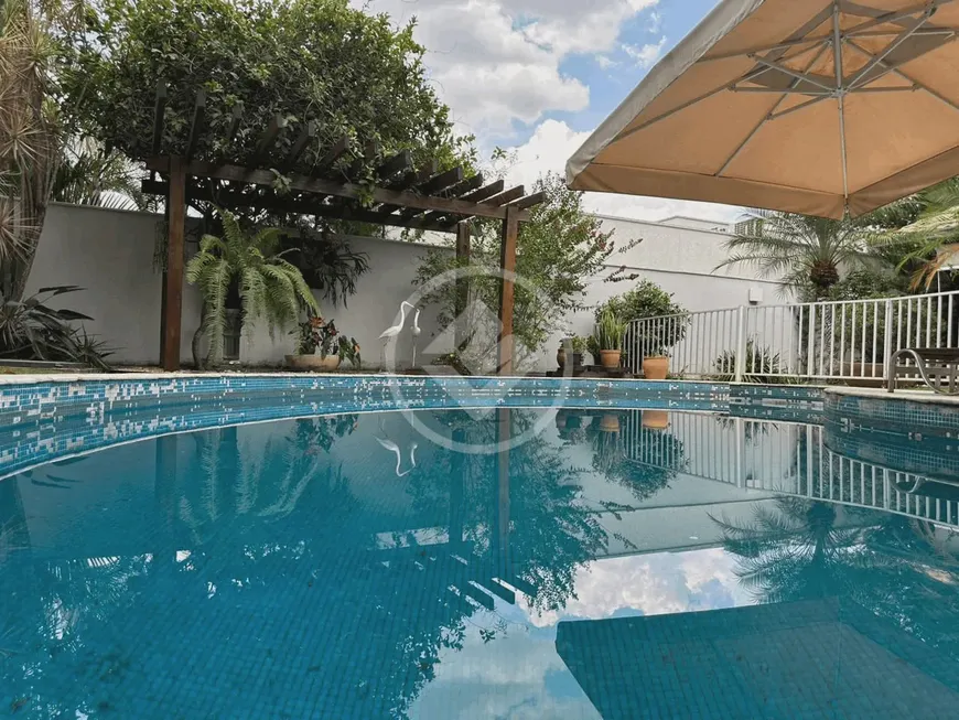 Foto 1 de Casa de Condomínio com 4 Quartos à venda, 348m² em Jardins Milão, Goiânia