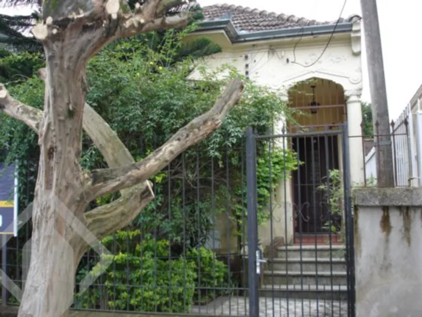 Foto 1 de Casa com 4 Quartos à venda, 180m² em Auxiliadora, Porto Alegre