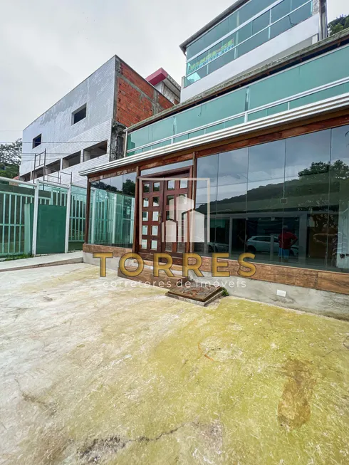 Foto 1 de Sobrado com 5 Quartos à venda, 350m² em Enseada, Guarujá