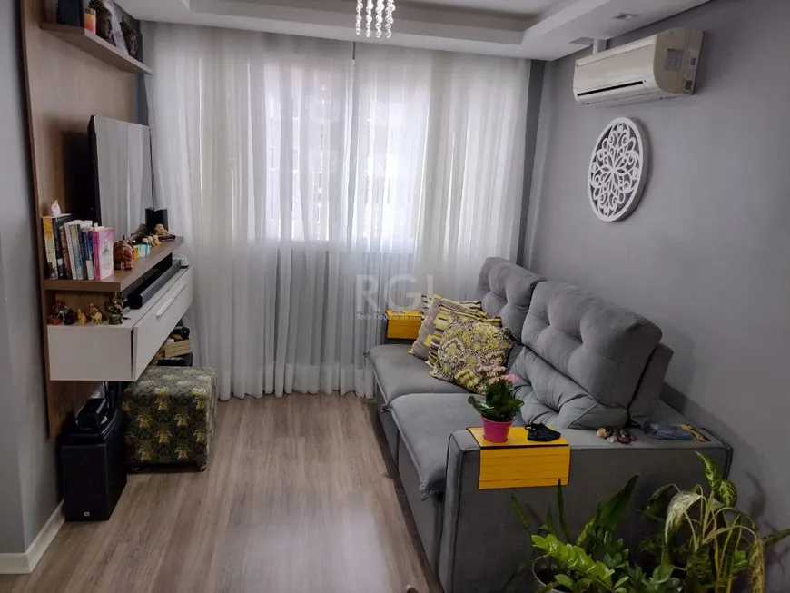 Foto 1 de Apartamento com 2 Quartos à venda, 51m² em Vila Nova, Porto Alegre