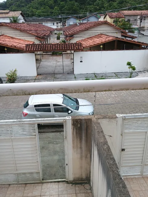 Foto 1 de Casa de Condomínio com 2 Quartos à venda, 80m² em Martin de Sá, Caraguatatuba