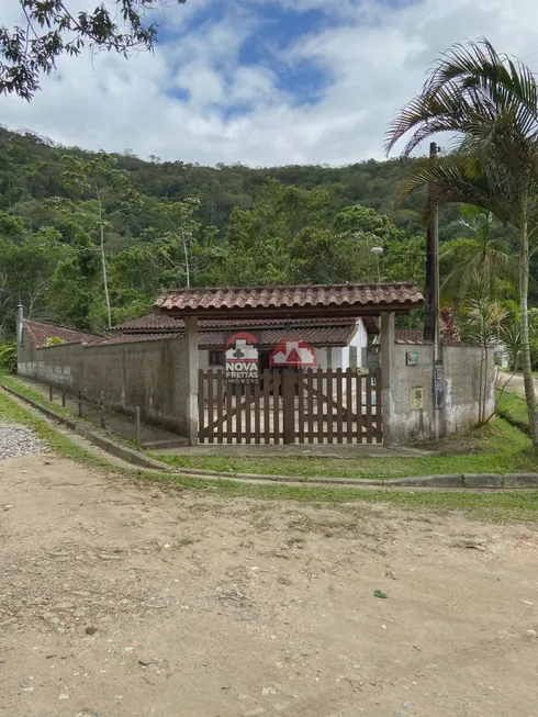 Foto 1 de Casa com 2 Quartos à venda, 150m² em Verde Mar, Caraguatatuba