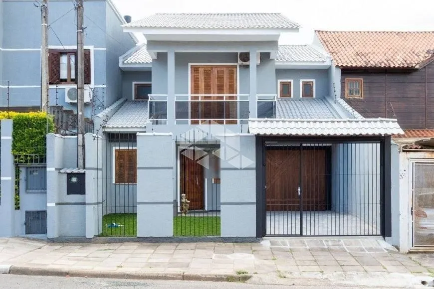 Foto 1 de Casa com 3 Quartos à venda, 229m² em Vila Nova, Porto Alegre