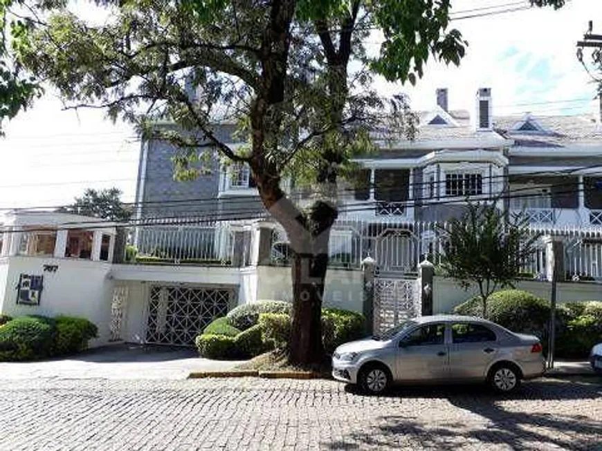 Foto 1 de Casa de Condomínio com 4 Quartos para alugar, 567m² em Três Figueiras, Porto Alegre