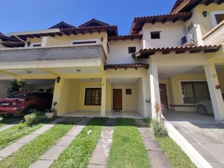 Foto 1 de Casa de Condomínio com 3 Quartos à venda, 193m² em Cavalhada, Porto Alegre