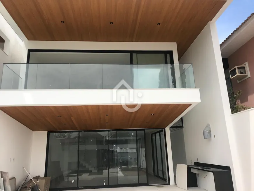 Foto 1 de Casa com 3 Quartos à venda, 450m² em Barra da Tijuca, Rio de Janeiro