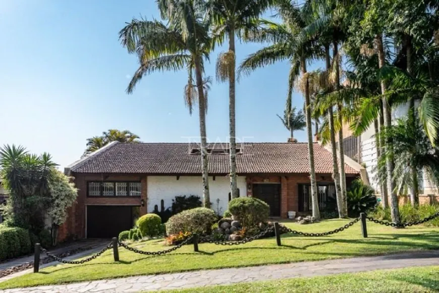 Foto 1 de Casa com 4 Quartos à venda, 365m² em Vila Assunção, Porto Alegre