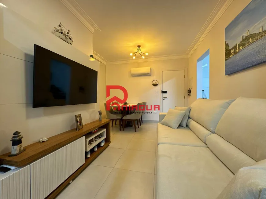 Foto 1 de Apartamento com 2 Quartos à venda, 77m² em Canto do Forte, Praia Grande