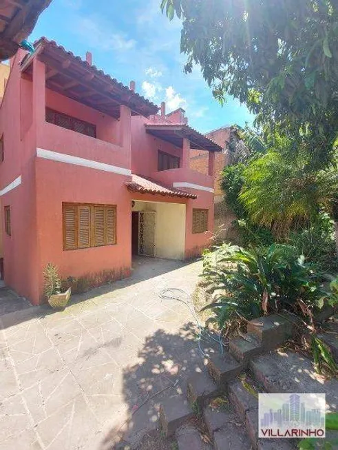 Foto 1 de Casa com 4 Quartos à venda, 400m² em Vila Nova, Porto Alegre