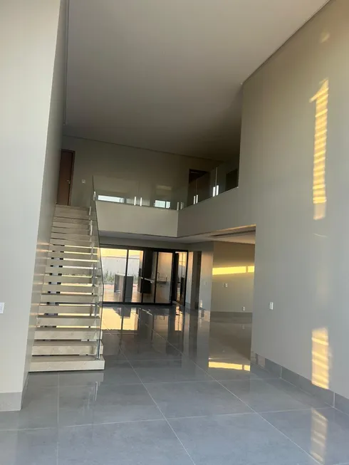 Foto 1 de Casa de Condomínio com 5 Quartos à venda, 443m² em Jardins Italia, Goiânia