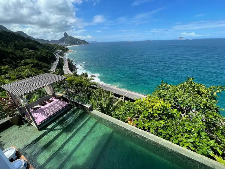 Foto 1 de Casa de Condomínio com 5 Quartos para venda ou aluguel, 400m² em Joá, Rio de Janeiro