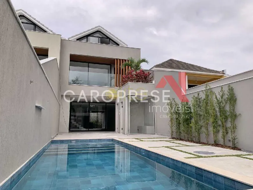 Foto 1 de Casa com 4 Quartos à venda, 230m² em Barra da Tijuca, Rio de Janeiro