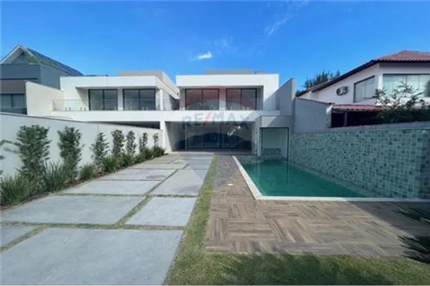 Foto 1 de Casa de Condomínio com 6 Quartos à venda, 380m² em Barra da Tijuca, Rio de Janeiro