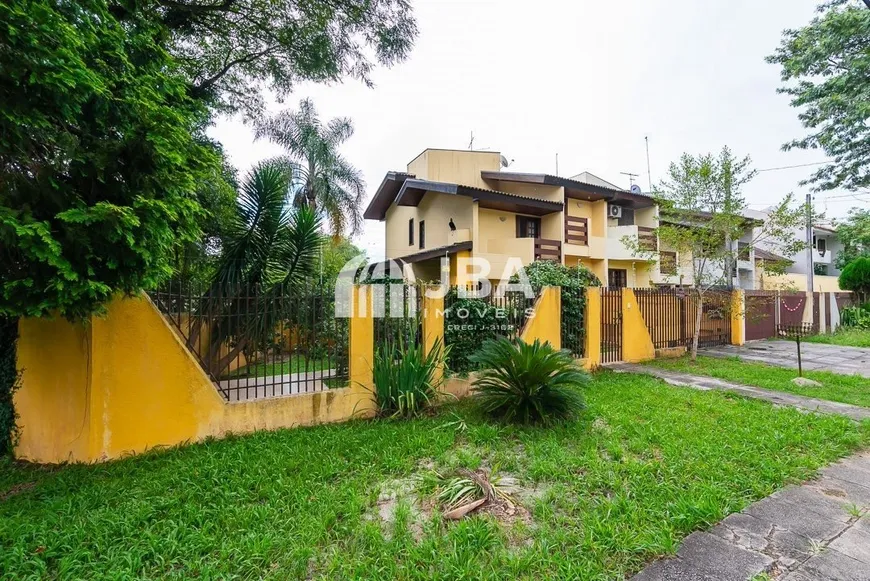 Foto 1 de Sobrado com 4 Quartos à venda, 153m² em Jardim das Américas, Curitiba