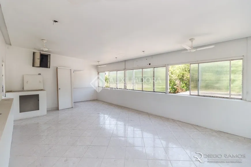 Foto 1 de Casa com 3 Quartos à venda, 249m² em Auxiliadora, Porto Alegre