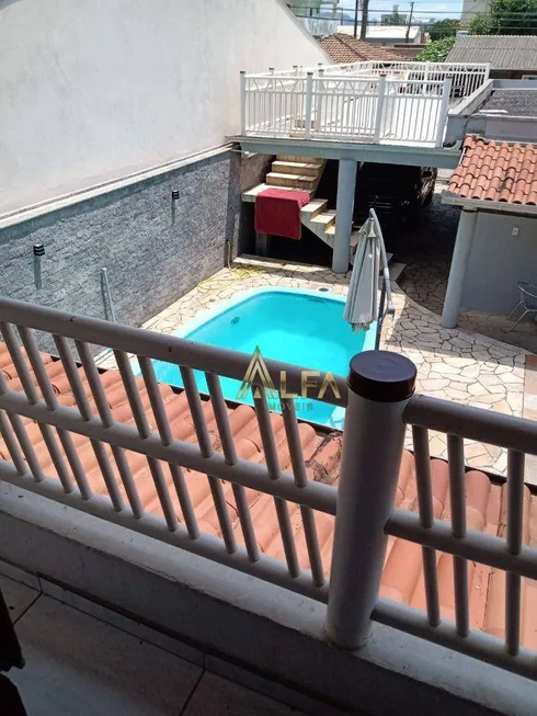 Foto 1 de Casa com 5 Quartos à venda, 160m² em Centro, Navegantes