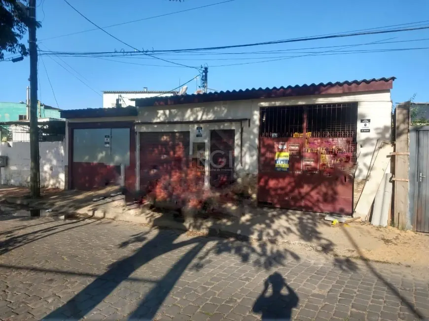 Foto 1 de Sobrado com 3 Quartos à venda, 101m² em Restinga, Porto Alegre