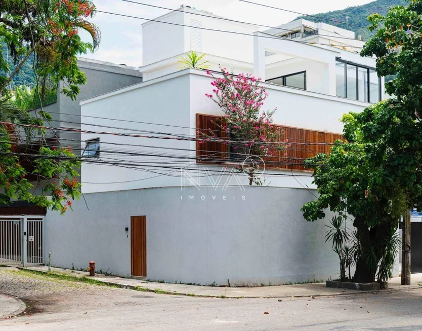 Foto 1 de Casa de Condomínio com 4 Quartos à venda, 490m² em Jardim Botânico, Rio de Janeiro