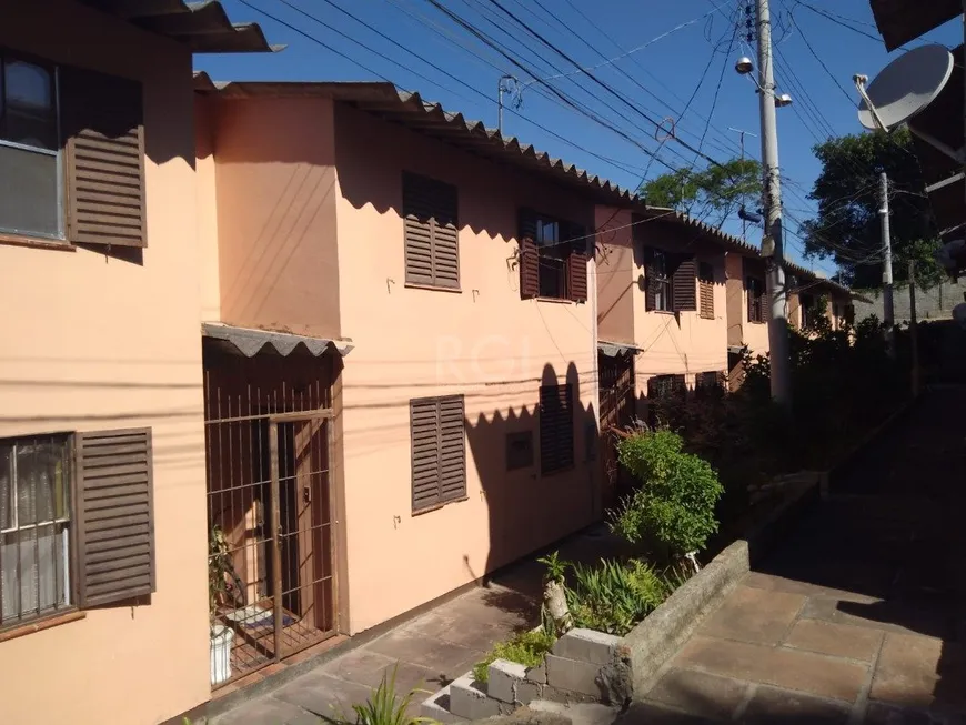 Foto 1 de Casa de Condomínio com 2 Quartos à venda, 61m² em Cavalhada, Porto Alegre